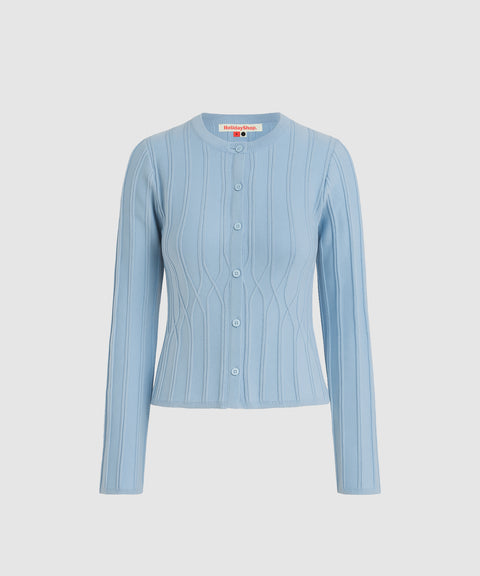 Light blue ribbed sweater on a light gray background