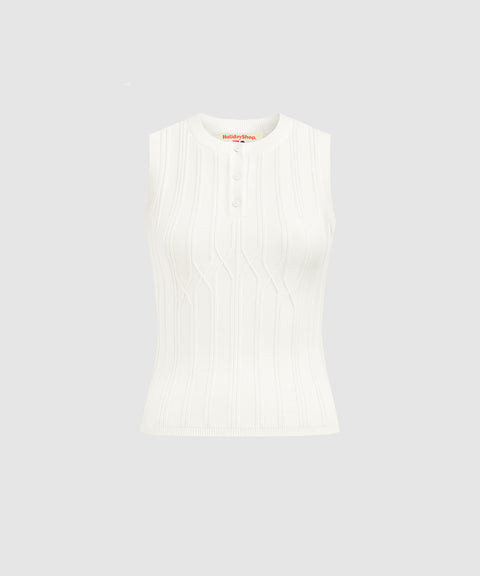 White sleeveless blouse on a light gray background